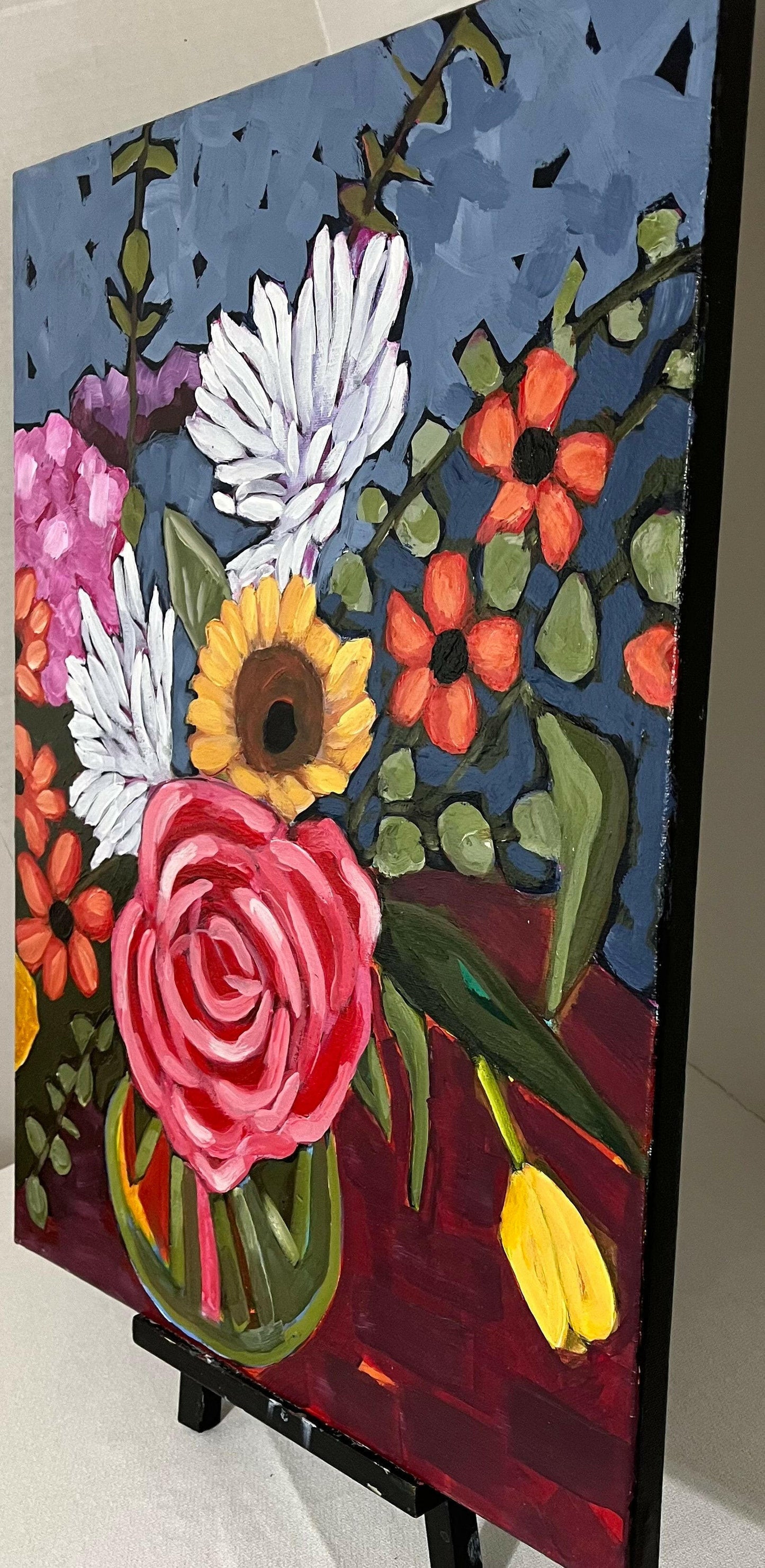 Side View Artistic depiction of a colorful flower arrangement painting against a dark blue and purple background.
