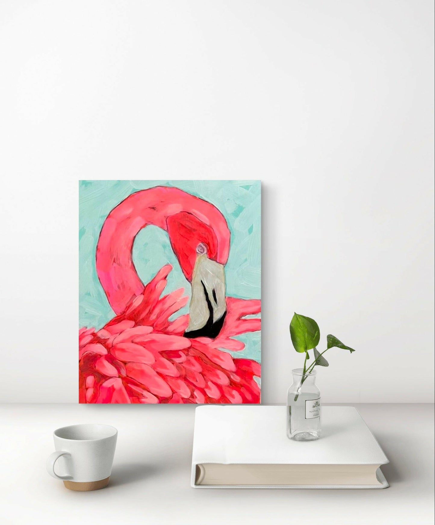 An 8x10 wood painting featuring a close-up of a pink flamingo with a gracefully curved neck and detailed beak, set against a soft, light blue background.