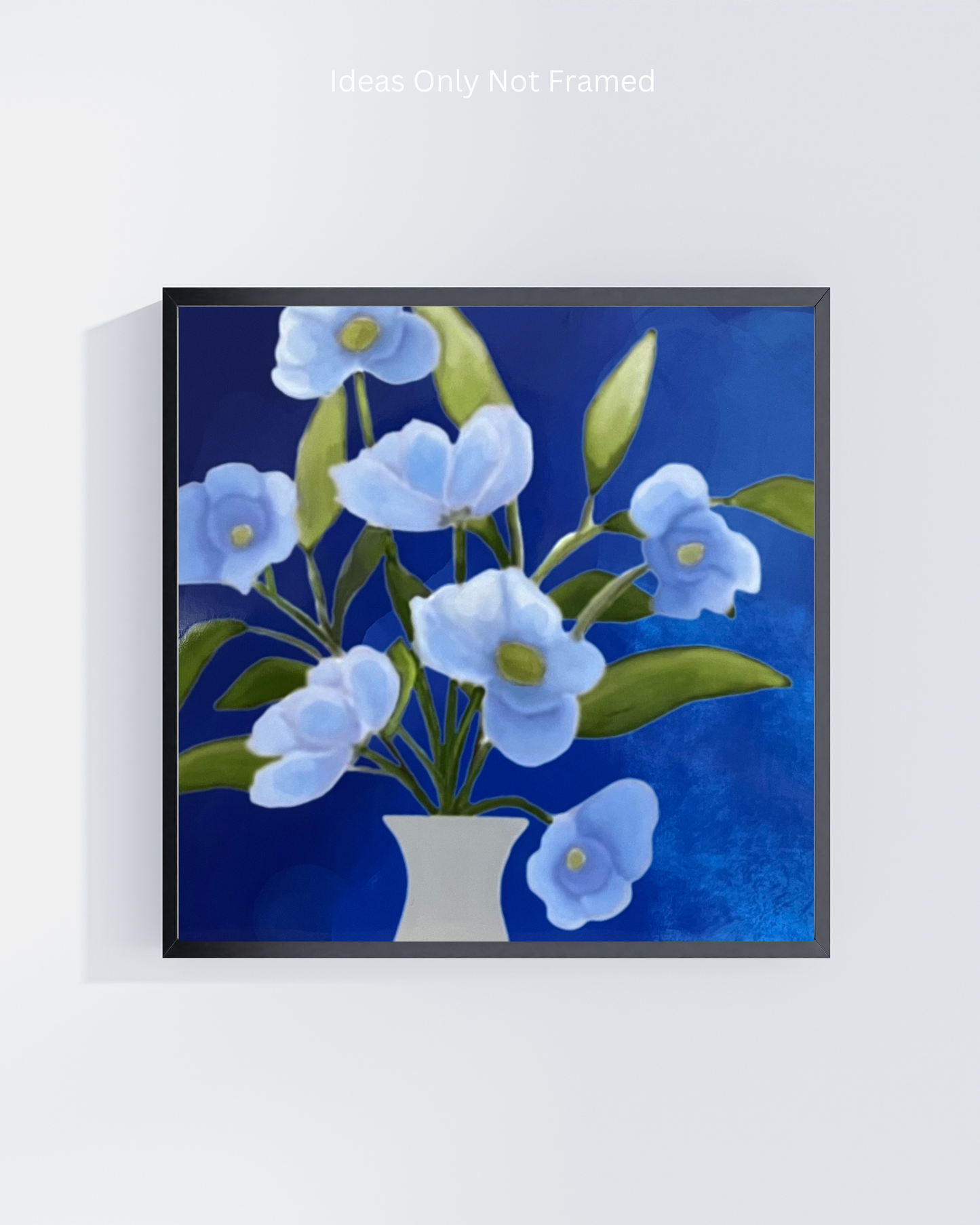 Detailed view of the white vase holding blue flowers against a textured dark blue background.