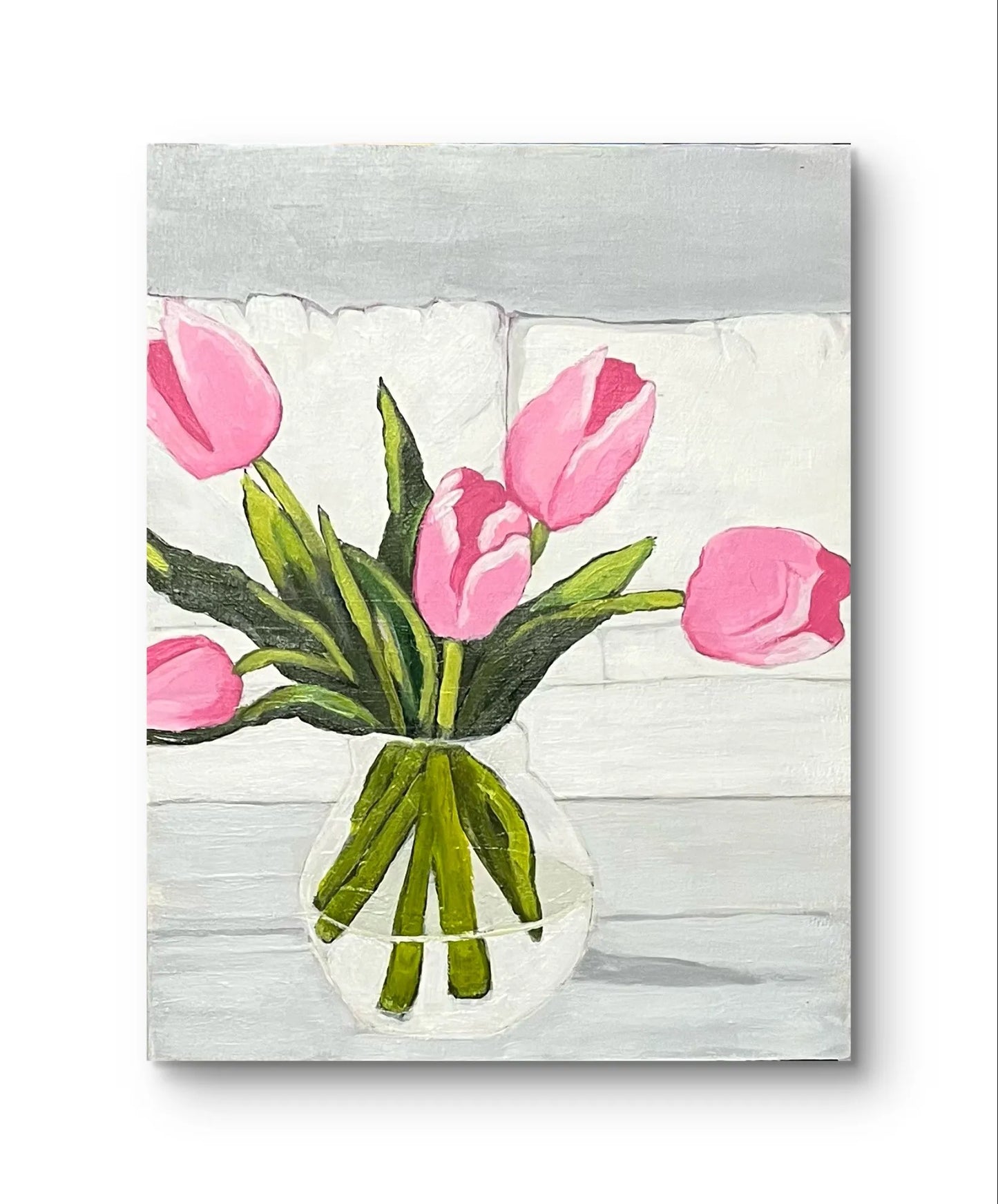 Colorful 8x10 artwork on wood, featuring a bouquet of pink tulips with prominent green foliage, set in a transparent vase on a painted surface.