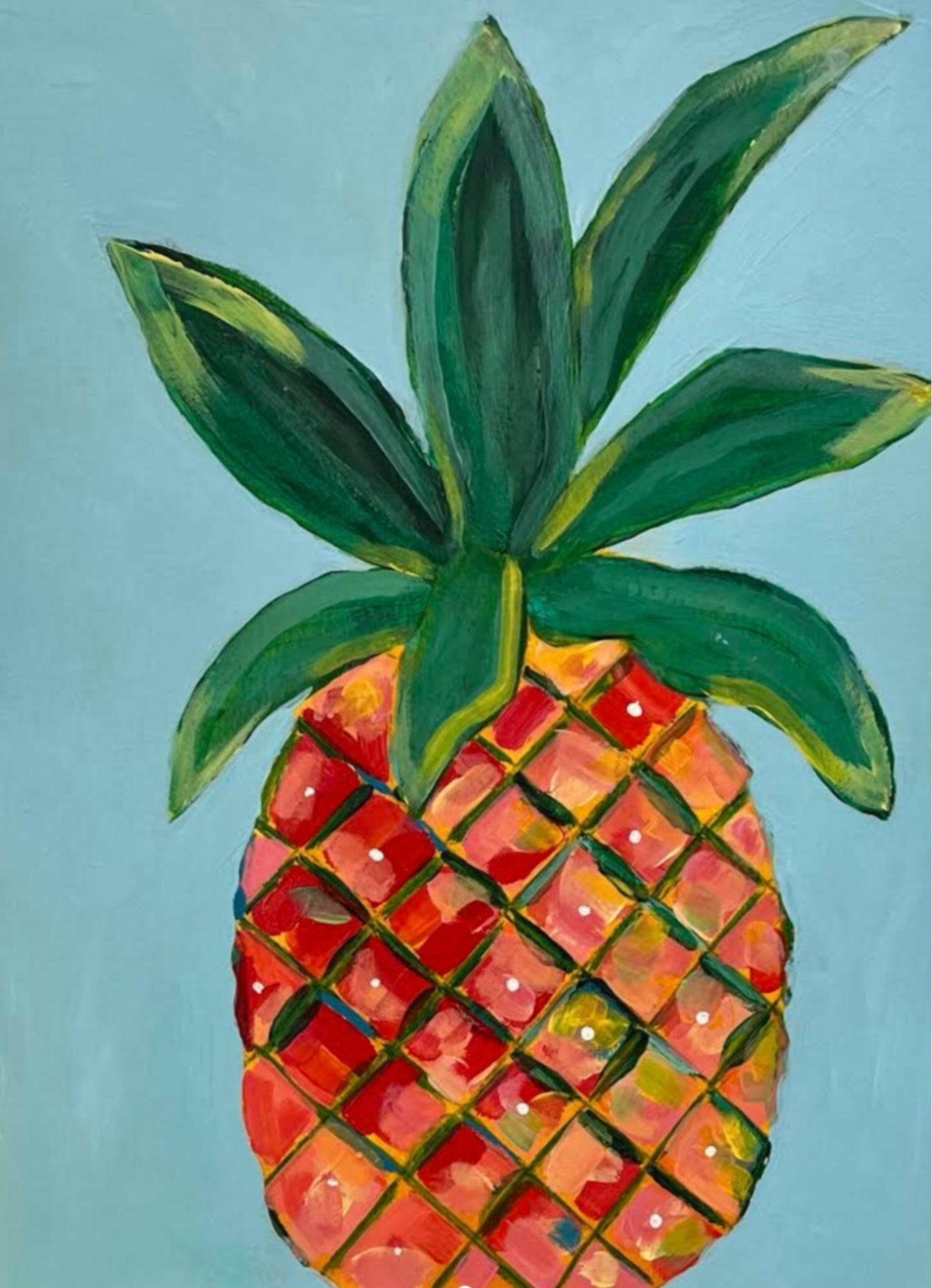  Close-up of the textured red and orange body of a pineapple in a colorful tropical print.